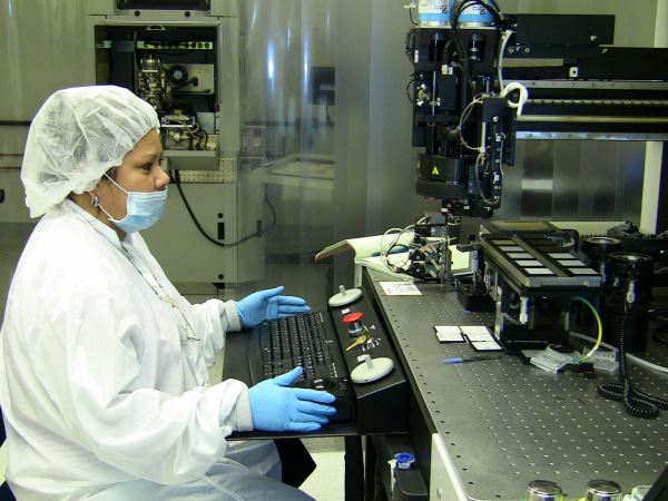 operator on an automated die attach machine